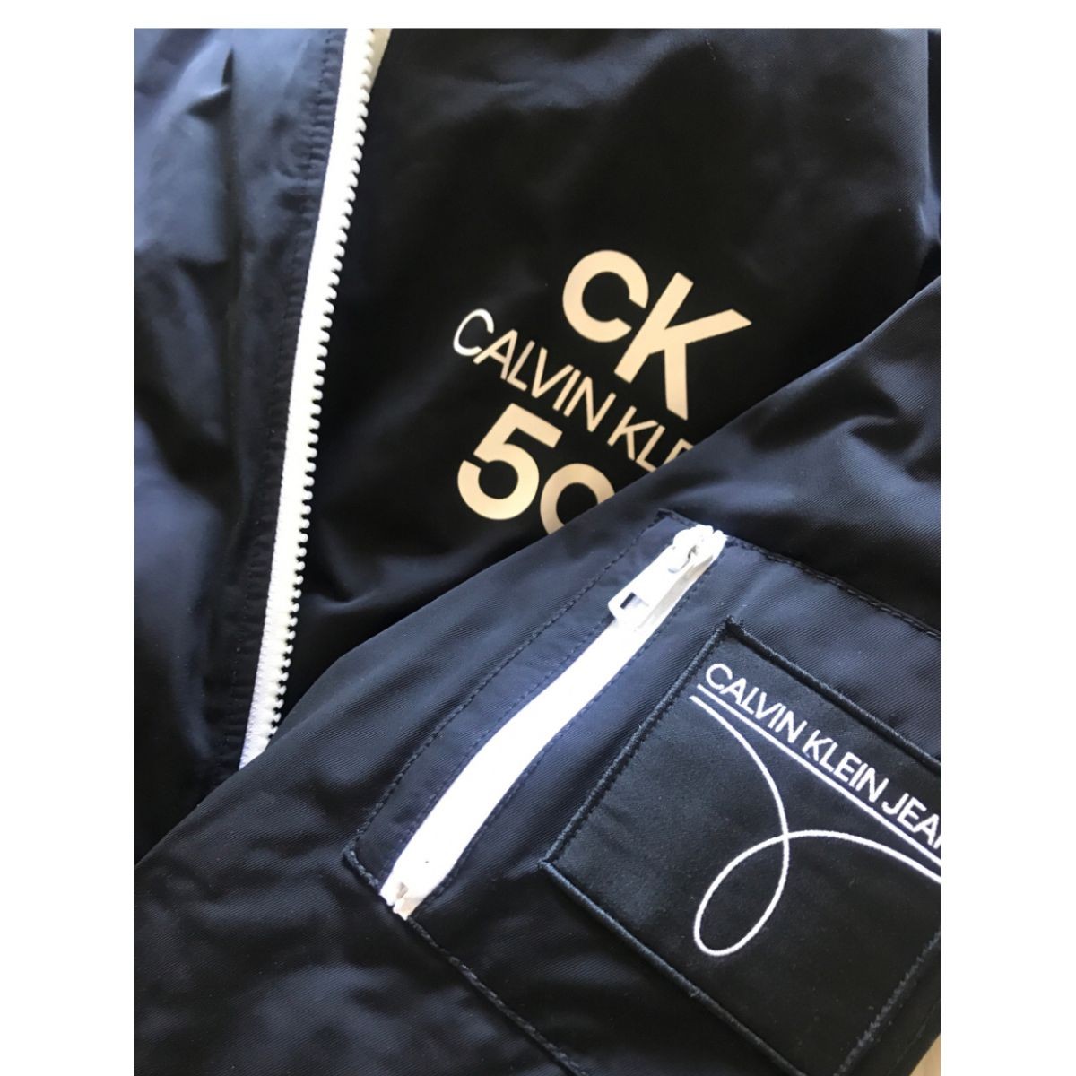 Calvin Klein Jeans 50th Anniversary logo limited edition cropped bomber  jacket size S | My good closet